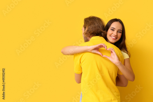 Hugging young couple in sty...