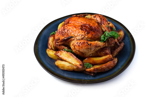 Fried whole chicken, with potatoes, on a white background, no people.