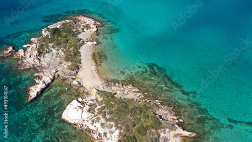 Aerial drone photo of small seaside village and small islets of Peristera with crystal clear turquoise sea ideal for quiet vacation close to Athens, Salamina island, Saronic Gulf, Greece