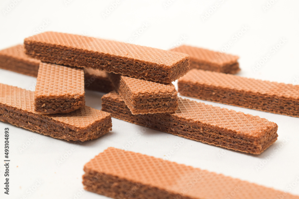 Pile of delicious chocolate wafers, on white background. Pile of delicious chocolate wafers, on white background.