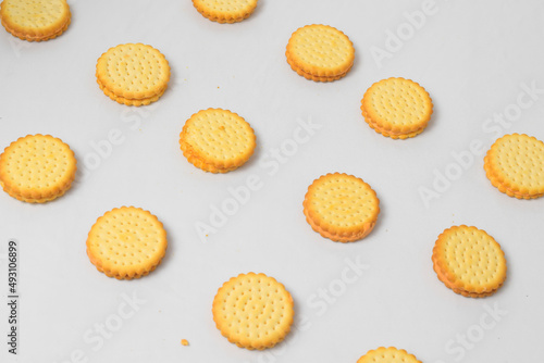 Cheese-flavored biscuits, photo from the top corner, isolated on a white background