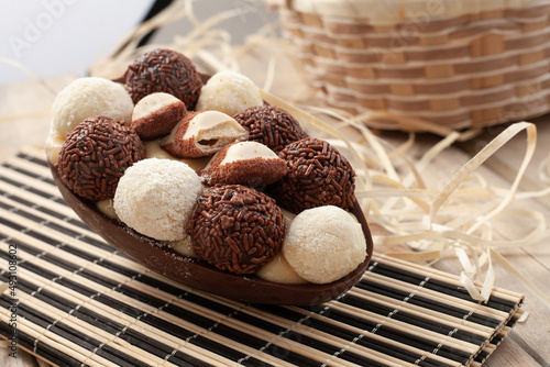 Photography homemade easter egg with chocolate, brigadeiro and nest milk.