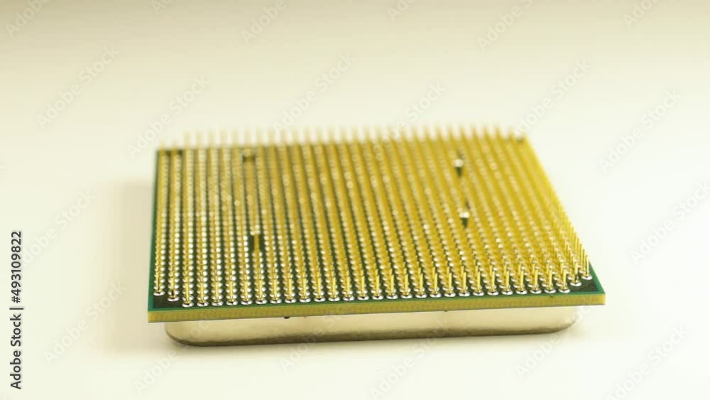 CPU. An old processor of 2009 release Athlon II X2 240 on a white background. Virtual Museum of Electronics. CPU. An old processor of 2009 release Athlon II X2 240 on a white background. Virtual Museum of Electronics.