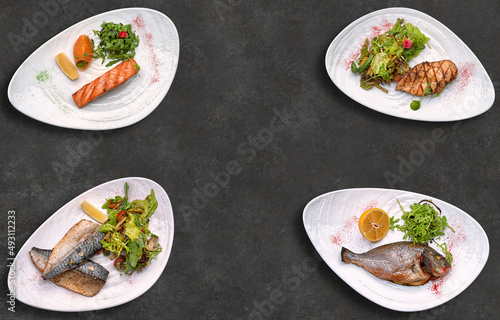 Assorted fried fish, on a dark background with space for text