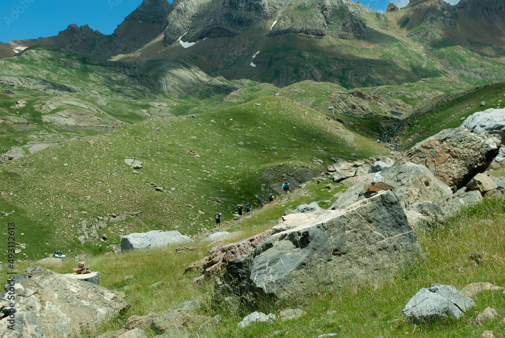Mountaineers walking in the mountains Mountaineers walking in the mountains