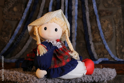 Obraz na plátně Vintage doll with blonde hair