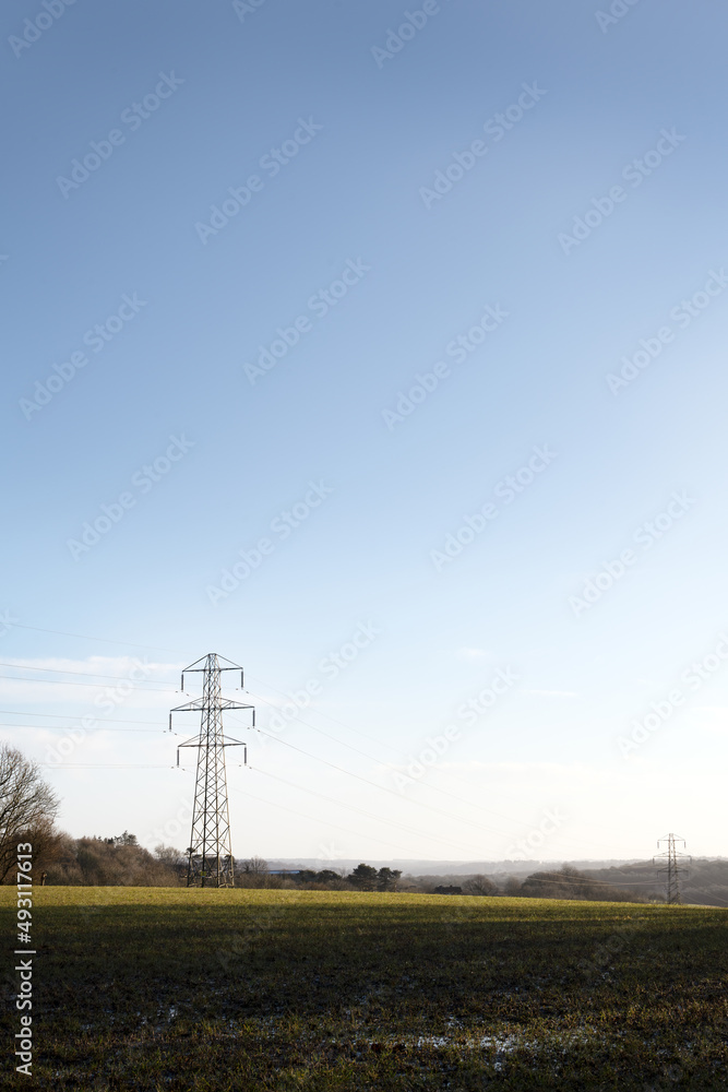Electric pylon in the countryside in winter in England