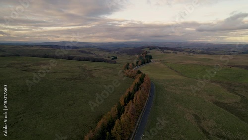 Grass Meadow Under Cloudy Sky by Drone in French Lowland
