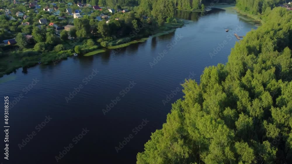 Aerial View Of Summer River Landscape And Small Village In Sunny Summer Evening Aerial View Of Summer River Landscape And Small Village In Sunny Summer Evening