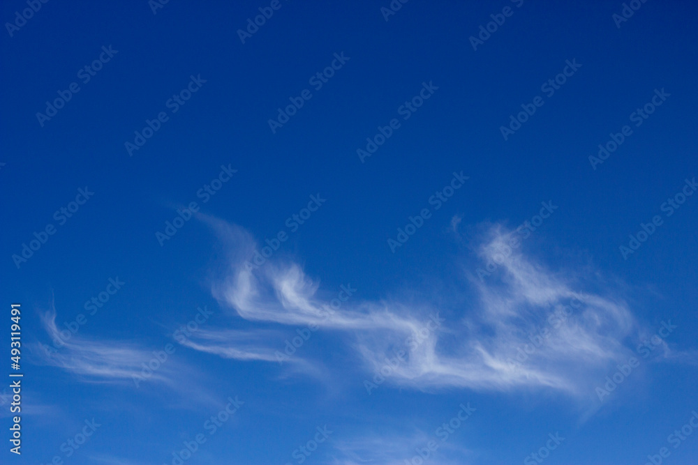 blue sky with wavy clouds blue sky with wavy clouds
