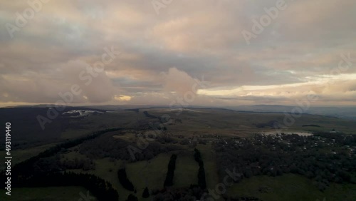 Drone Above French Lowland Under Clouds at Sunset