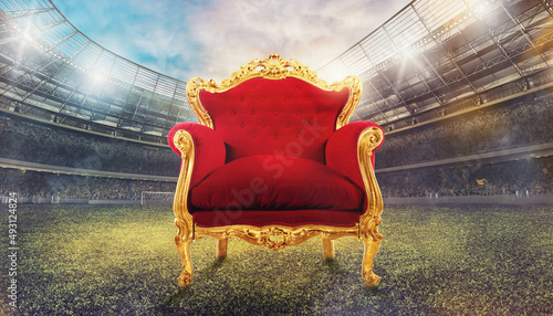 Comfortable and luxury velvet armchair in a soccer stadium photo