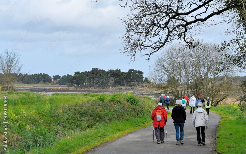 Obraz premium Group of senior hikers in Brittany-France