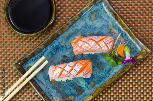 Plate with two elegant nigiri sushi (nigirizushi)