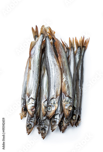 Smoked dry capelin isolated on white background photo