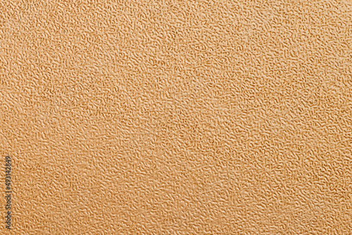 Quadro em tela Full frame of artifical fabric with an orange homogeneous texture