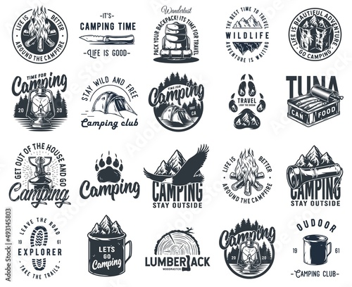 Set of monochrome camping and travel emblems, including campfire, flag, wood, lantern, forest