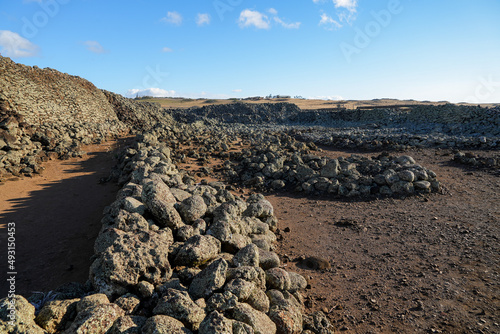 Mo'okini Heuiau in the north of Big Island, Hawaii - Ruins of a temple of the Hawaiian religion in the Kohala Historical Sites State Monument near Upolu Point photo