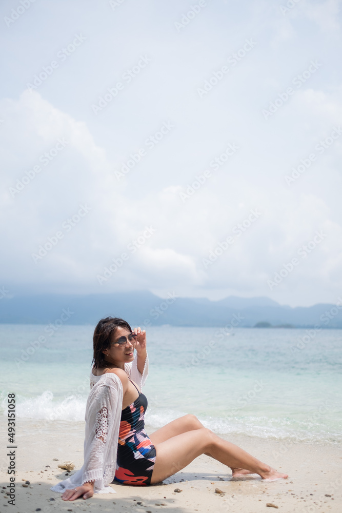 Portrait bikini girl with sea background, asian woman, beauty concept Portrait bikini girl with sea background, asian woman, beauty concept