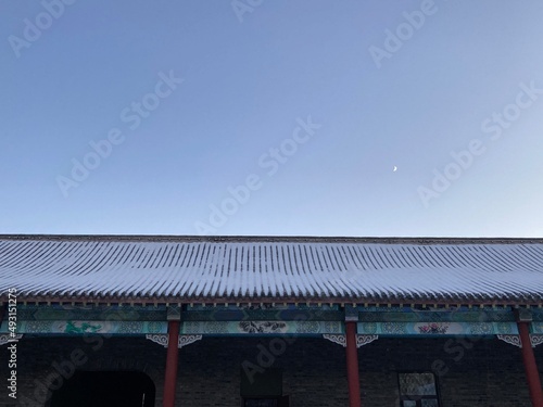 chinese roof with snow