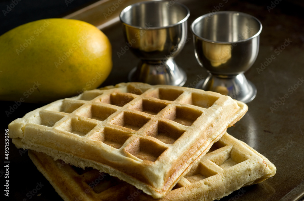 Close View of Delicious Waffles with Mango Close View of Delicious Waffles with Mango