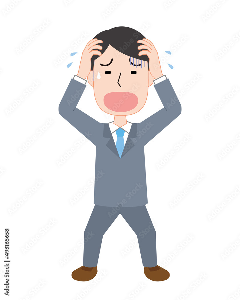 頭を抱えてあせる男性 頭を抱えてあせる男性