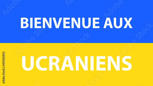 FLAG OF UKRAINE WITH THE PHRASE WELCOME UKRAINIANS IN FRENCH © Victor Photo Stock
