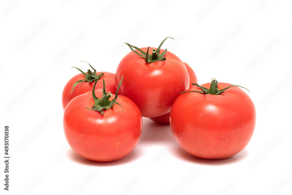 Red tomato on a white background. For grocery stores. Red tomato on a white background. For grocery stores.