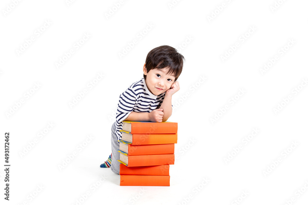 little boy wearing glasses with books on white background, education concept. little boy wearing glasses with books on white background, education concept.
