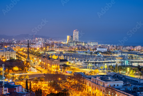 View of Barcelona with the Columbus Statue from Montjuic mountain at night