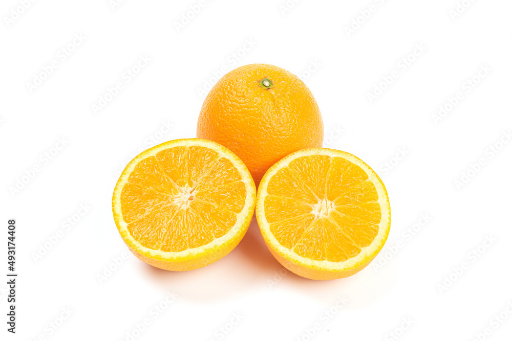 Orange fruit with cut in half isolated on white background. Orange fruit with cut in half isolated on white background.