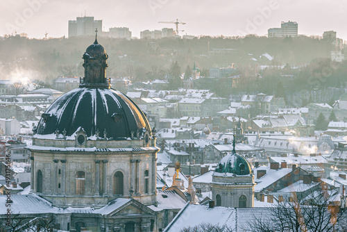 Lviv, Ukraine - February, 2022: City view from the Vysoky Zamok (Lviv castle hill), the dome of Dominican church. photo