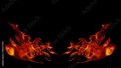 Flame Flame Texture For Strange Shape Fire Background Flame meat that is burned from the stove or from cooking. danger feeling abstract black background Suitable for banners or advertisements.