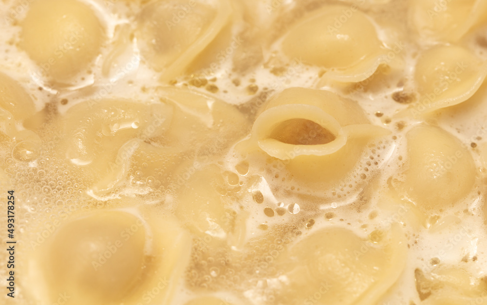 Dumplings made from dough and meat are boiled in boiled water. Dumplings made from dough and meat are boiled in boiled water.