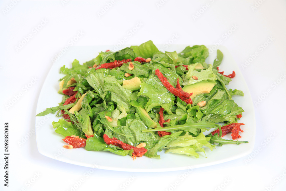 Fresh vegetable salad with tomatoes and avocado Fresh vegetable salad with tomatoes and avocado
