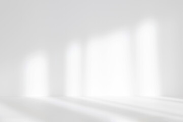 Abstract white studio background for product presentation. Empty room with shadows of window. Display product with blurred backdrop. Soft focus