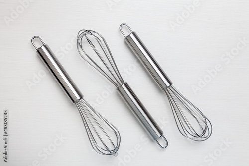 Stainless Steel Kitchen Whisk Egg Beater White Background