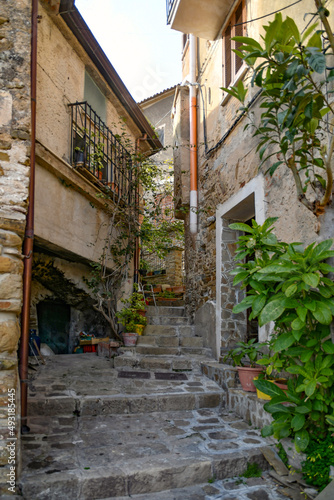A narrow street among the old stone houses of Castellabate, town in Salerno province, Italy. © Giambattista