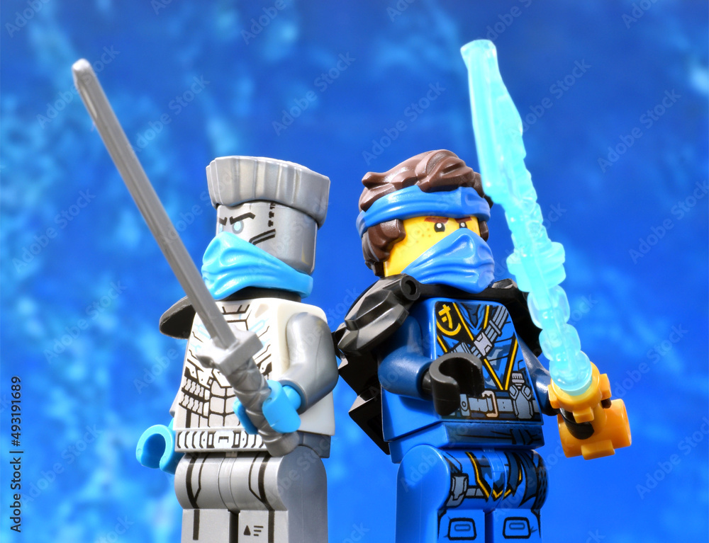 Editorial illustrative image of lego ninjago minifugures blue ninja Jay  with sword weapon, white ninja Zane on blue Stock Photo | Adobe Stock