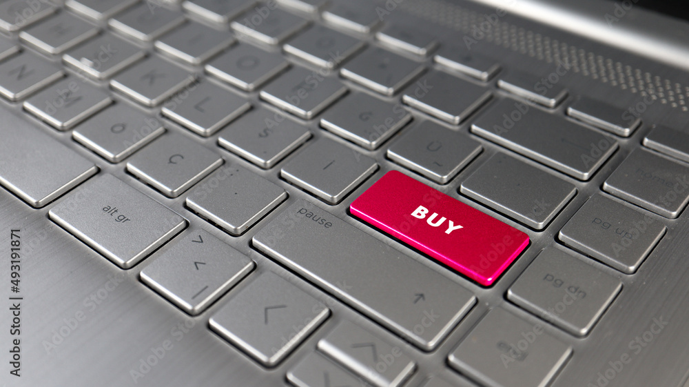 Keyboard with buy text on the enter button, represents buy, metaphor of signs Keyboard with buy text on the enter button, represents buy, metaphor of signs