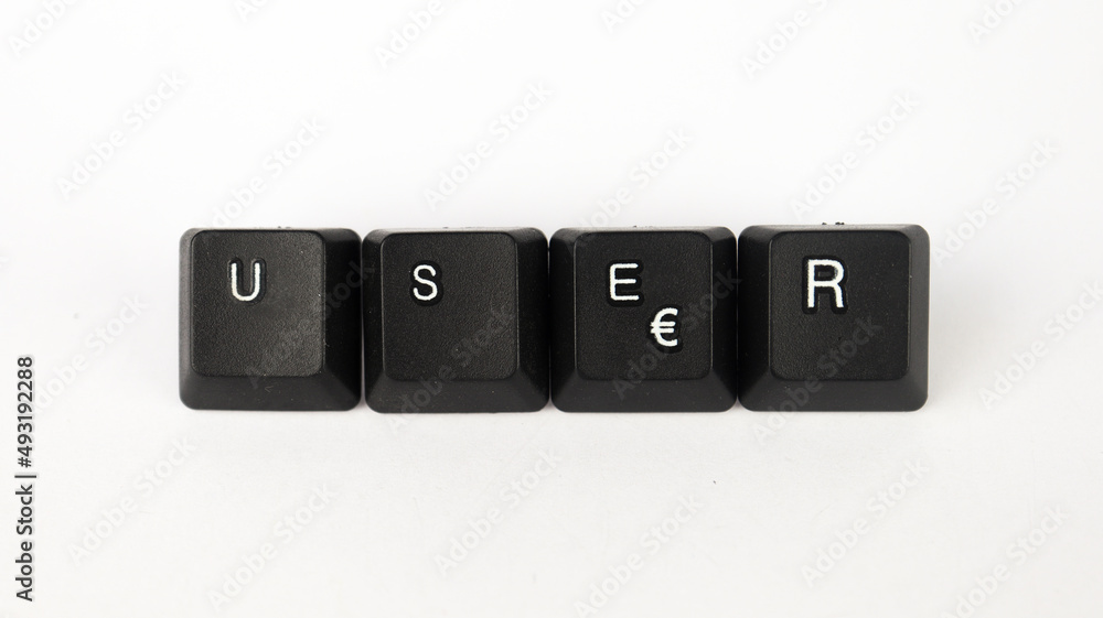 User text created with keyboard keys isolated on white background, white user letters on black keyboard, top view User text created with keyboard keys isolated on white background, white user letters on black keyboard, top view