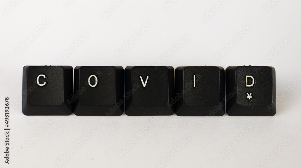 Covid text created with keyboard keys, isolated on white background, medicine terminology Covid text created with keyboard keys, isolated on white background, medicine terminology
