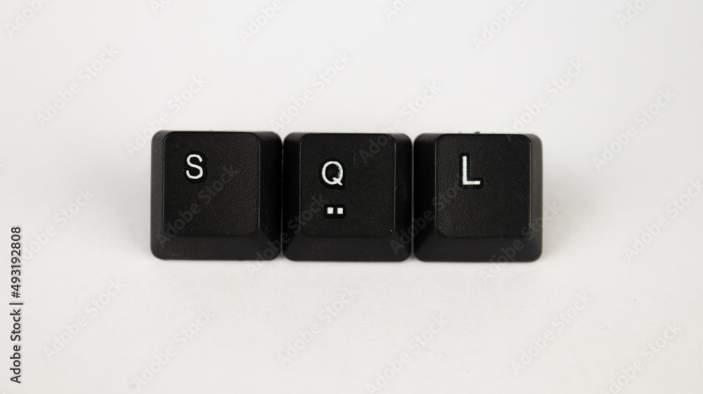 SQL text created with keyboard keys, isolated on white background, computer terminology