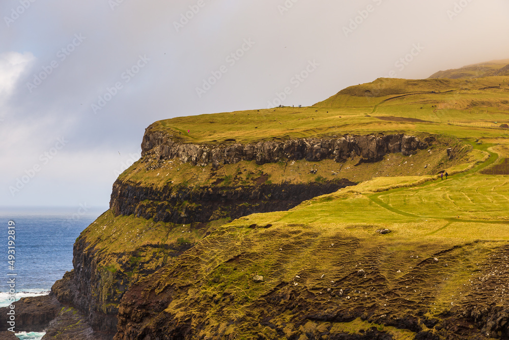 Fototapeta premium View of Mulafossur Waterfall, Faroe Islands.