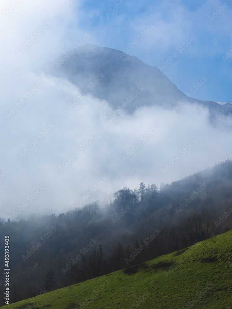 Mount Txindoki among the clouds in the Natural Park of the Aralar Mountains, Euskadi