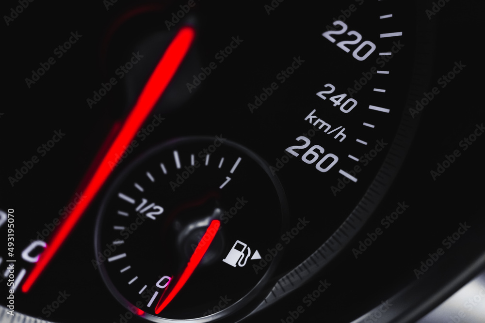 Sport car speedometer with red indicator close-up view, high speed concept photo