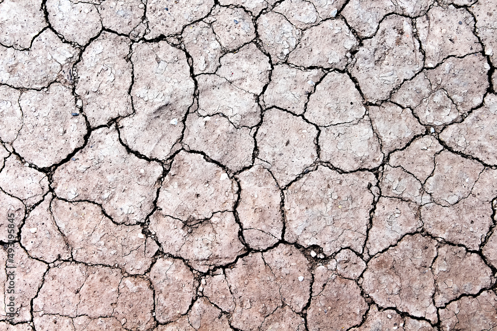 Dry soil with cracked texture arid backgroun top view Dry soil with cracked texture arid backgroun top view