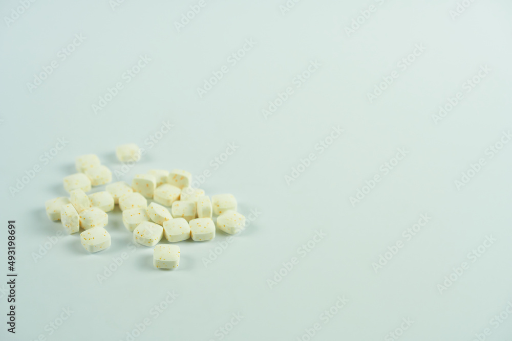Mint dragee close-up on a white background. Mint dragee close-up on a white background.