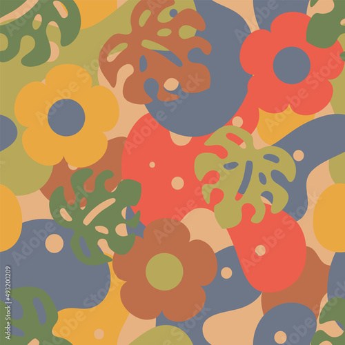 Colorful groove floral and tropical leaves camouflage seamless pattern background