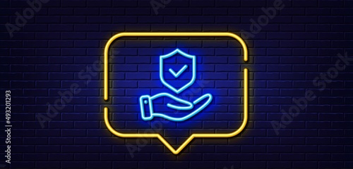 Neon light speech bubble. Insurance hand line icon. Risk coverage sign. Policyholder protection symbol. Neon light background. Insurance hand glow line. Brick wall banner. Vector